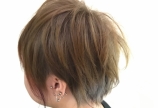 小林ショートを切る